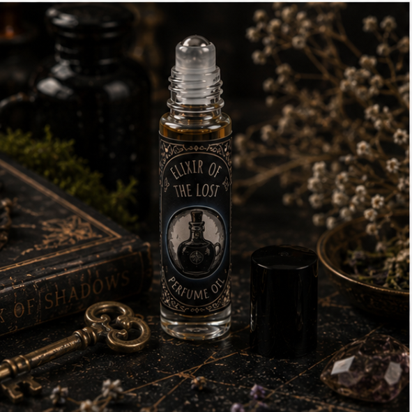 Elixir of the Lost perfume oil in a 10ml roller bottle with vintage apothecary artwork by Roaming Raven.