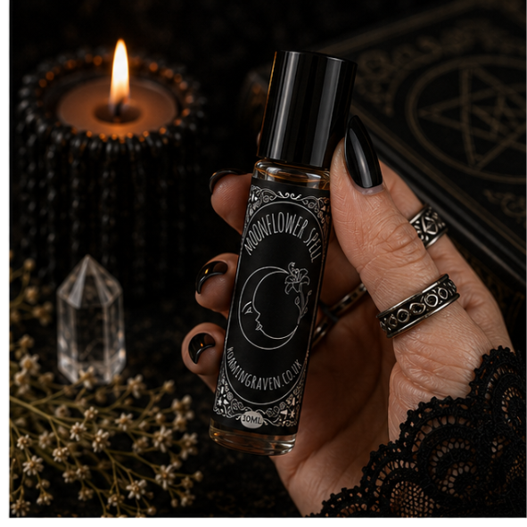 Moonflower Spell perfume oil in a 10ml roller bottle with celestial gothic artwork by Roaming Raven.