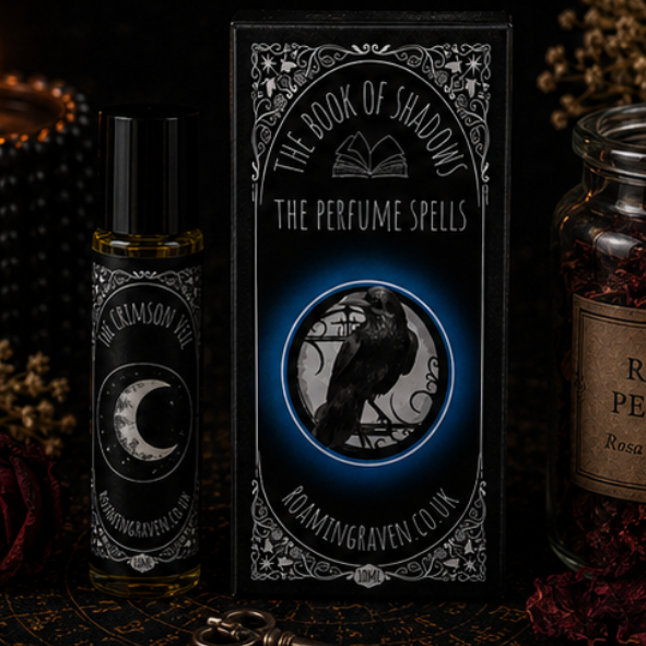 Crimson Veil perfume oil in a 10ml roller bottle with luxury Book of Shadows gift box by Roaming Raven.