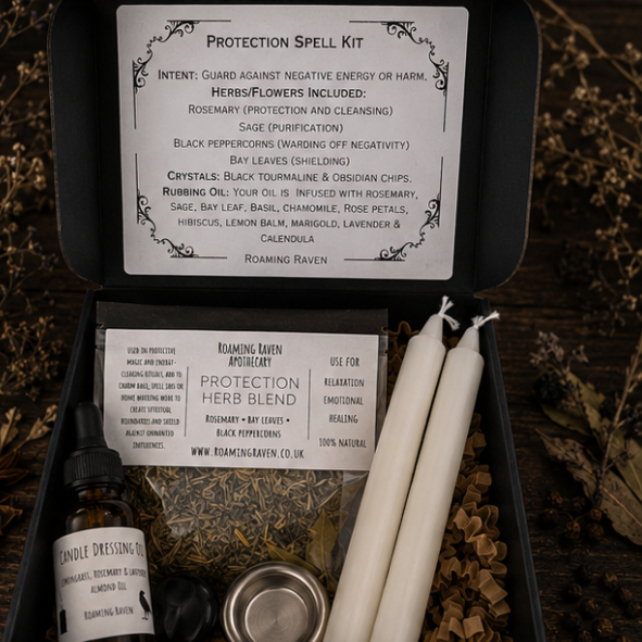 Open black presentation box displaying a protection spell kit with herbal blend, black crystal, candle dressing oil, spell candles and ritual instruction card.