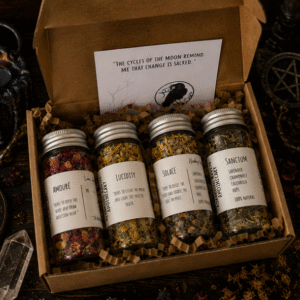 Herbal apothecary gift box with four handcrafted botanical herb blends by Roaming Raven including Amouré, Lucidity, Solace and Sanctum