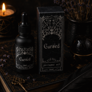 Cursed perfume oil by Roaming Raven in a 30ml black glass bottle with gothic gift box