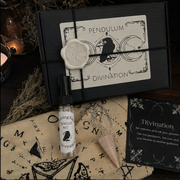 Complete witchcraft divination kit featuring a crystal pendulum, divination cloth, clairvoyant mist, yes and no decision coin and instruction cards on a mystical altar cloth.