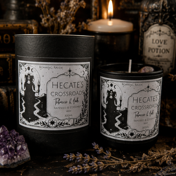 Hecate's Crossroads Tobacco & Oak crystal candle with amethyst moon and crystals on a witchy altar by Roaming Raven