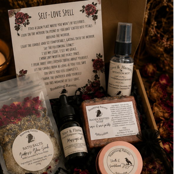 Aphrodite self love ritual gift box by Roaming Raven containing bath salts, handmade rose soap, massage oil, intention mist, self-love spell, herbal tea and ritual accessories.
