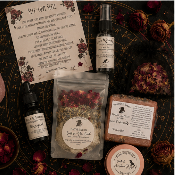 Aphrodite self love ritual gift box by Roaming Raven containing bath salts, handmade rose soap, massage oil, intention mist, self-love spell, herbal tea and ritual accessories.