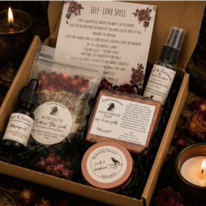 Aphrodite self love ritual gift box by Roaming Raven containing bath salts, handmade rose soap, massage oil, intention mist, self-love spell, herbal tea and ritual accessories.