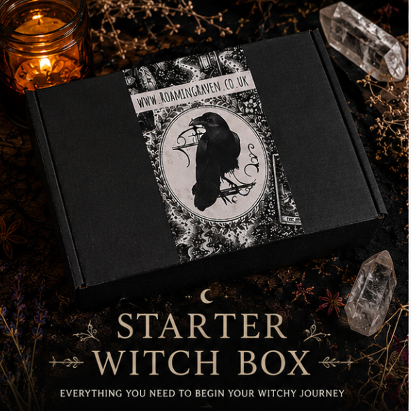 Roaming Raven Starter Witch Box in black gift box with raven sleeve, surrounded by crystals, candlelight and witchy altar décor.
