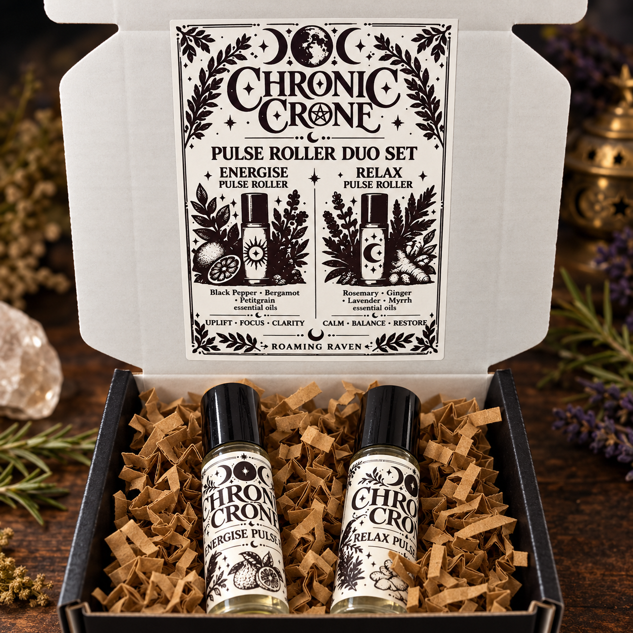 Open Chronic Crone gift box showing the illustrated Pulse Roller Duo label above the Energise and Relax bottles.