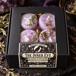 Angled open gift box containing four purple herbal tealights beneath “A Little Ritual of Intuition” lettering, with lavender and mugwort around it.